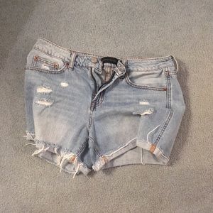 Light wash ripped jean shorts